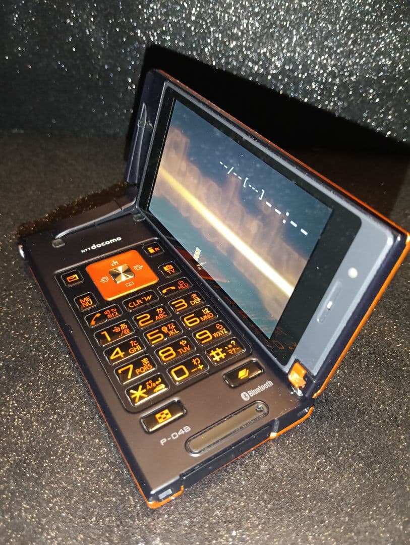 ガラケー docomo P-04B 折りたたみ携帯電話 パナソニック オレンジ