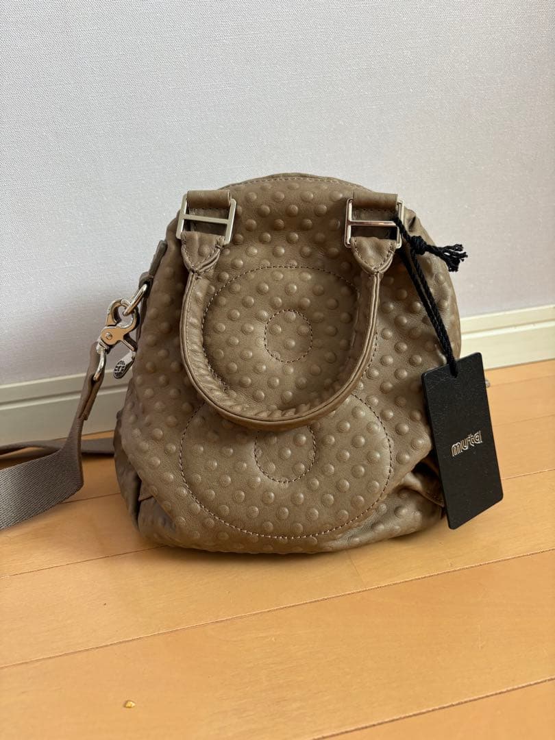 muta x garuglier エンボス8バッグ・カーフ 革