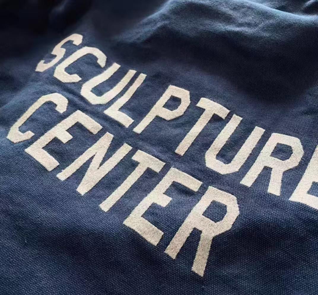 New Balance x Carhartt WIPフード付きネイビージャケット