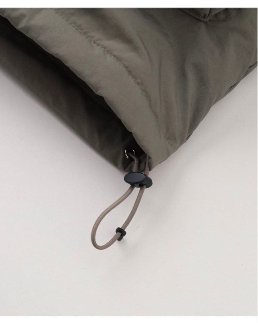 Estudio Niksen Raglan Puffer Jacket タグ付き