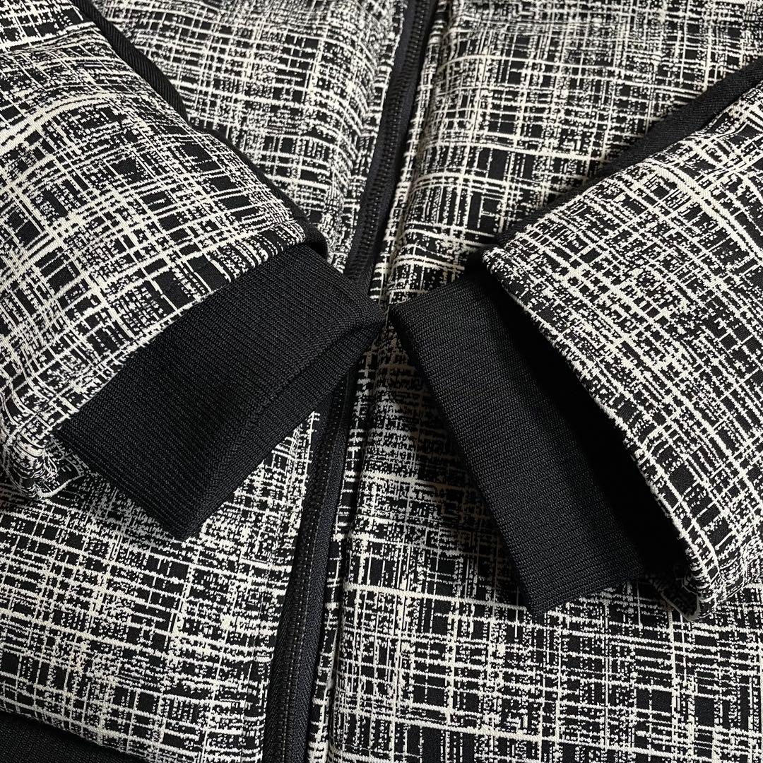 ウノピゥウノウグァーレトレ ダウンジャケット ツイード 袖リブ