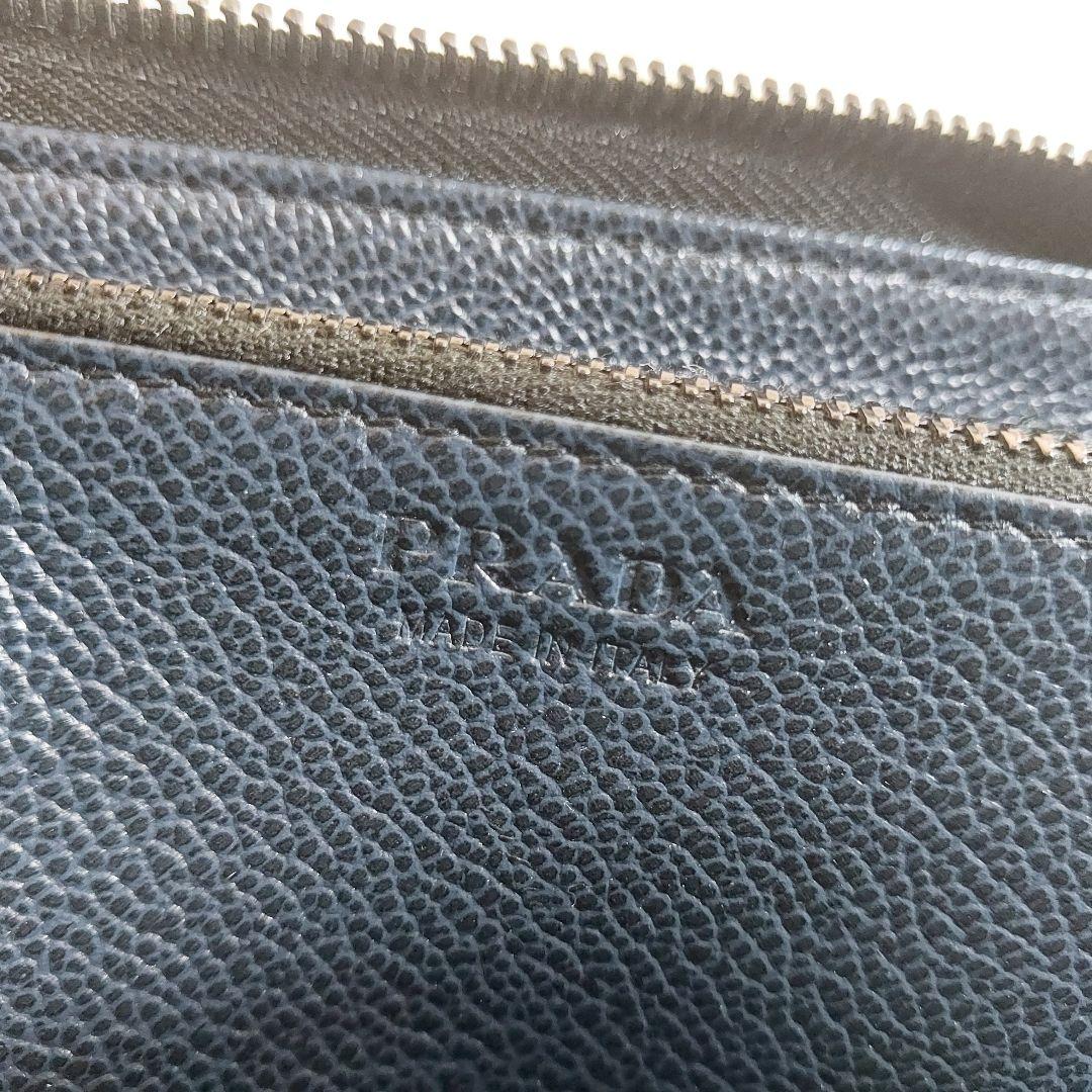 プラダ メタルロゴ ラウンドファスナー長財布 レザー ブラック 2ML317