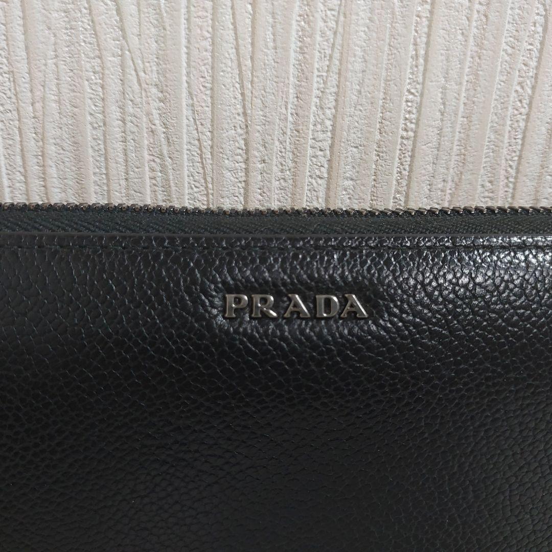 プラダ メタルロゴ ラウンドファスナー長財布 レザー ブラック 2ML317