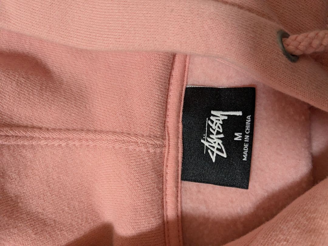STUSSY　パーカー　ロゴラスタライオン　ピンク　ステューシー