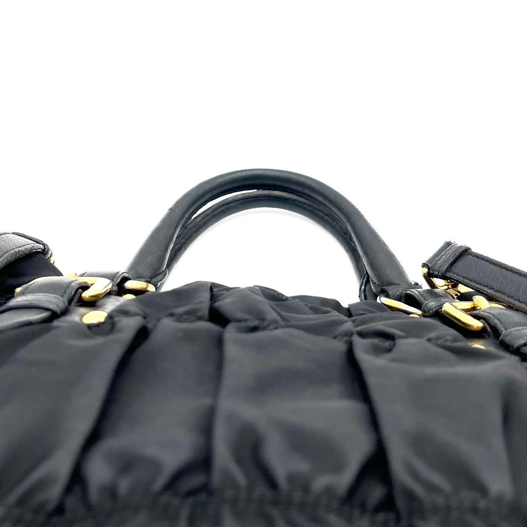 PRADAプラダ ボンバー ギャザー メタルロゴ G金具 2WAYハンドバッグ黒