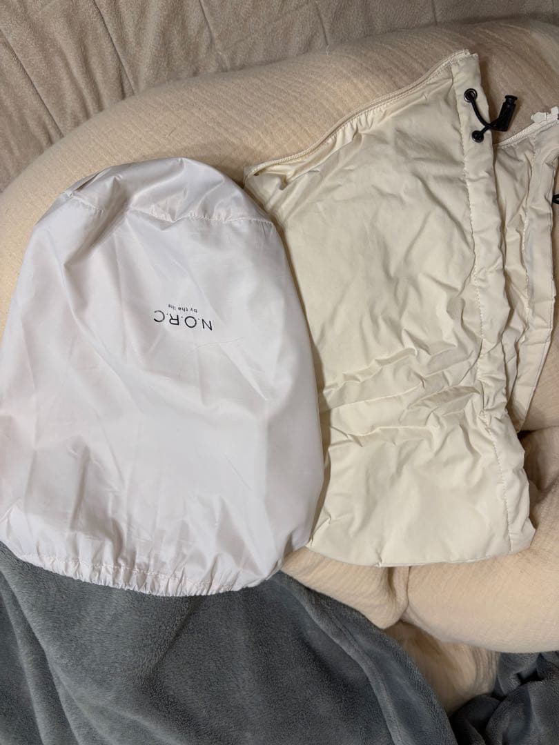 N.O.R.C パディングロングコート3 エクリュ