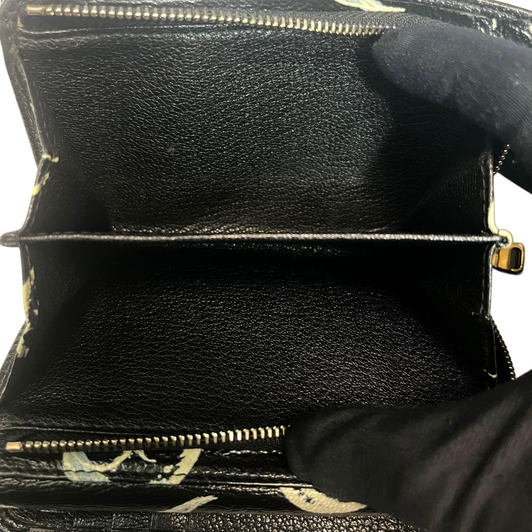 希少✨ミュウミュウ 二つ折り財布 マドラス 総柄 月 ムーン ブラック 黒