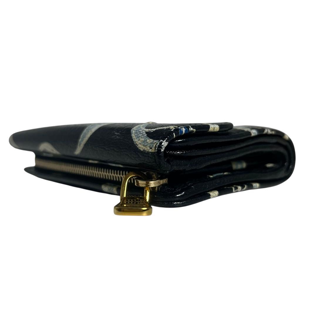 希少✨ミュウミュウ 二つ折り財布 マドラス 総柄 月 ムーン ブラック 黒