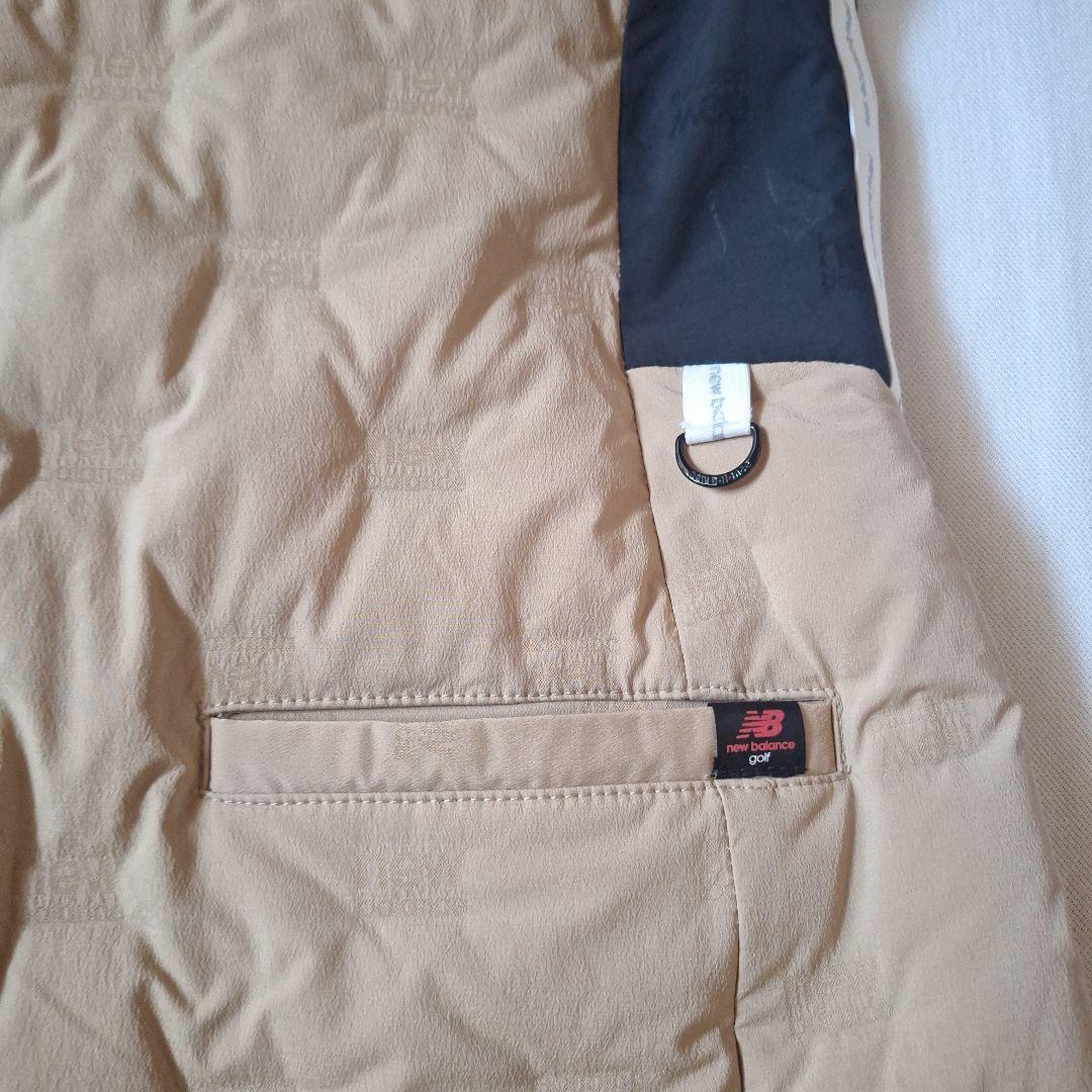 New Balance ベージュ ノースリーブダウンベスト