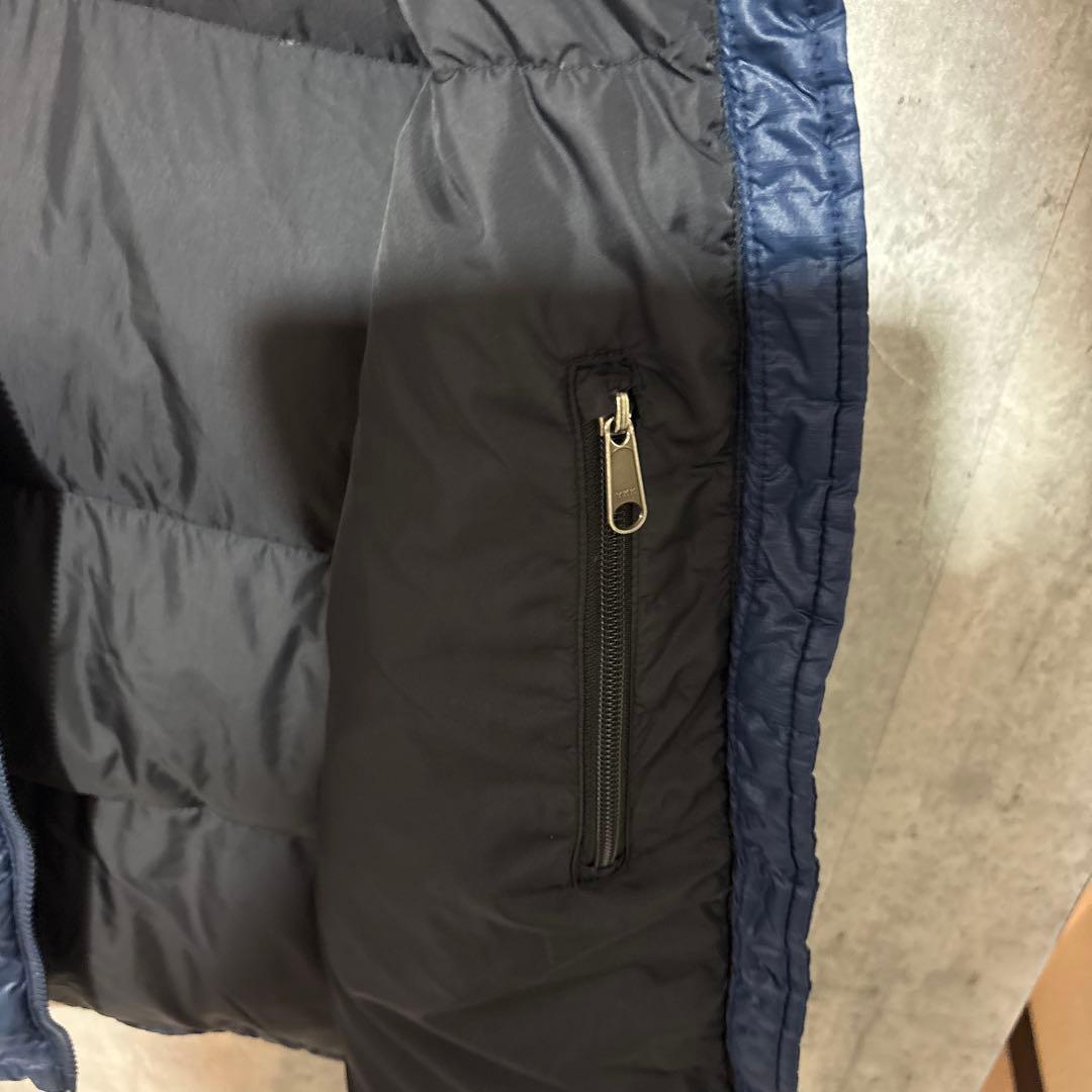 ノースフェイスヌプシダウンベスト700フィル刺繍口ゴドローコード