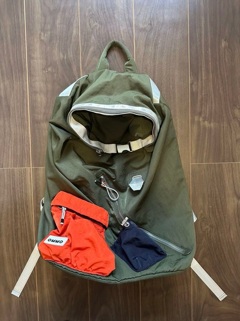 バッグ OMMO W FACE BACK PACK