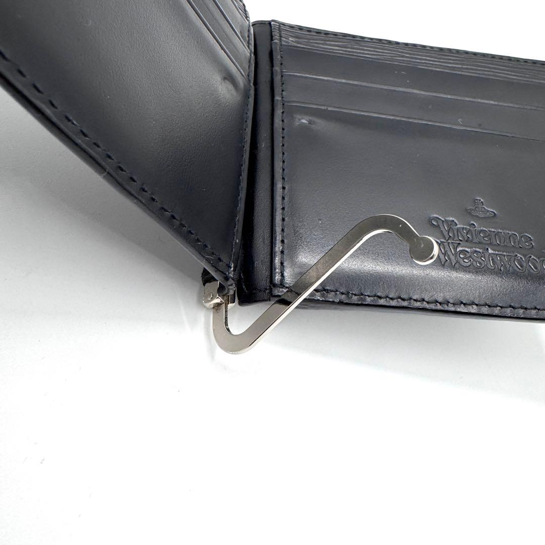 美品✨ヴィヴィアン　マネークリップ　小銭入れ付　二つ折り財布　オーブ型押し　黒