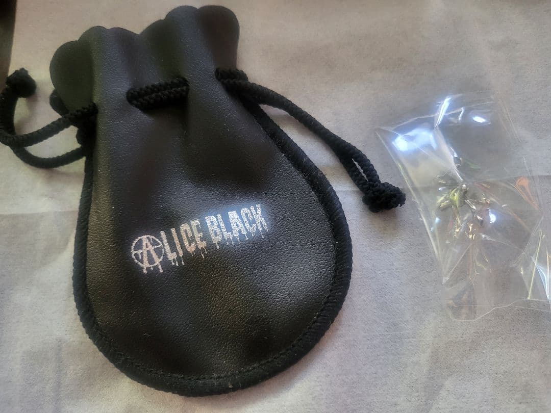 ALICE BLACK コルセットリボンピアス