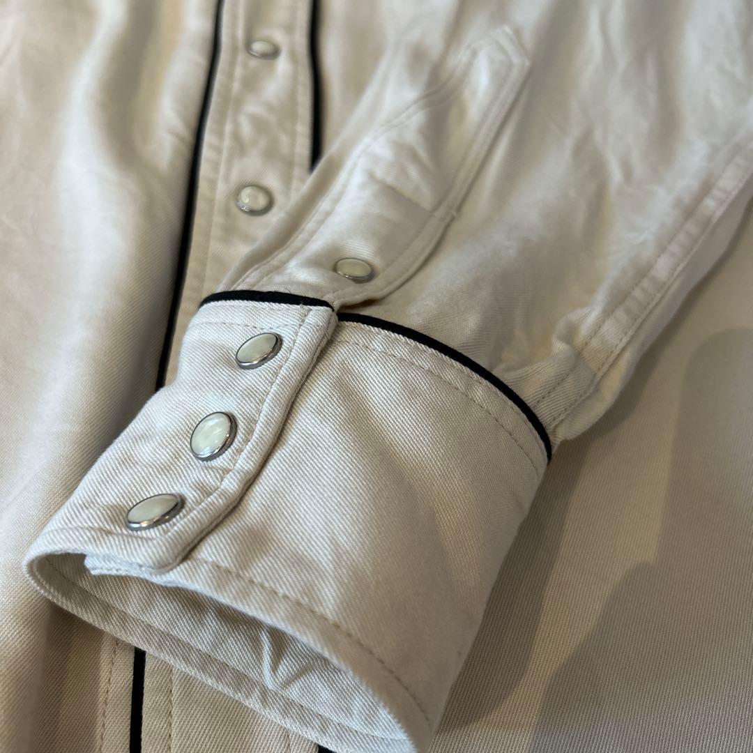 トップス The letters Western smile pocket Msize