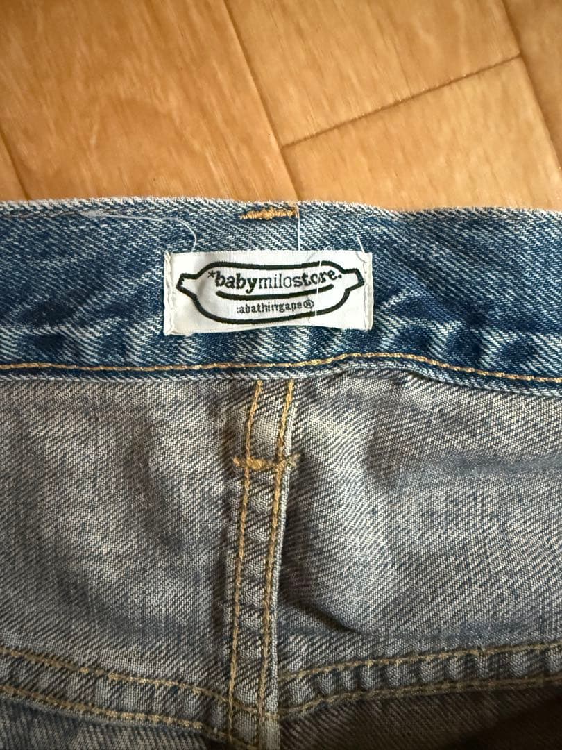 【服と書いて人】A BATHING APE 顔プリントデニムパンツ