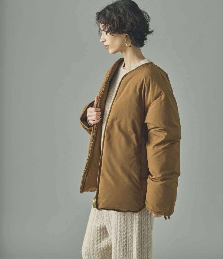 新品未使用Curensology サイドジップノーカラーダウンジャケット