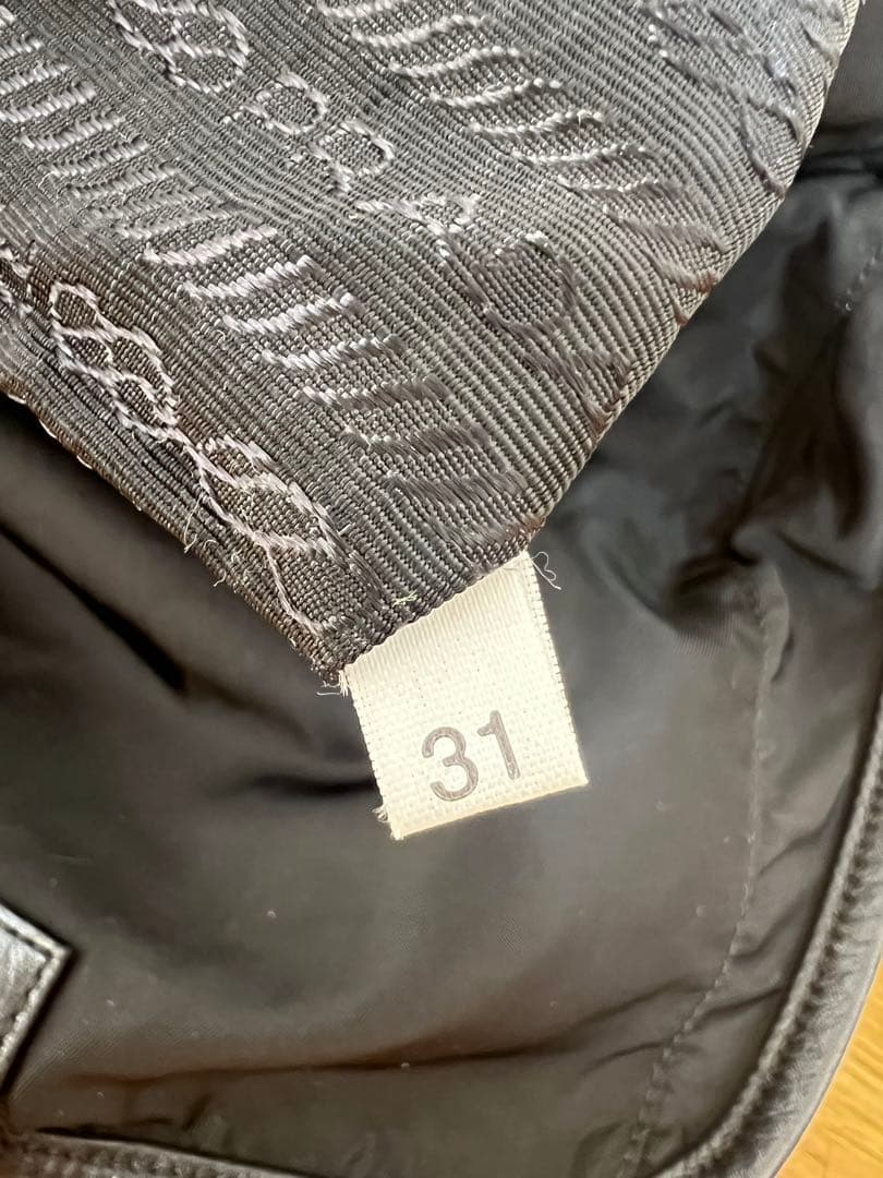 PRADA ナイロンリュック バック　黒　三角プレート