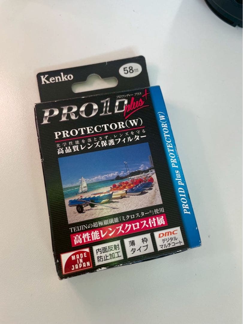 望遠ズームレンズEF-S55-250mmF4-5.6IS II、レンズカバー2種