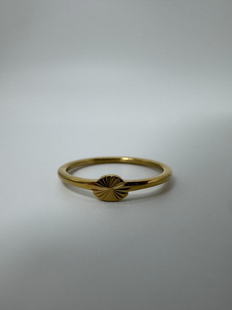 K18ゴールドリング 放射状彫刻0.71g/11号