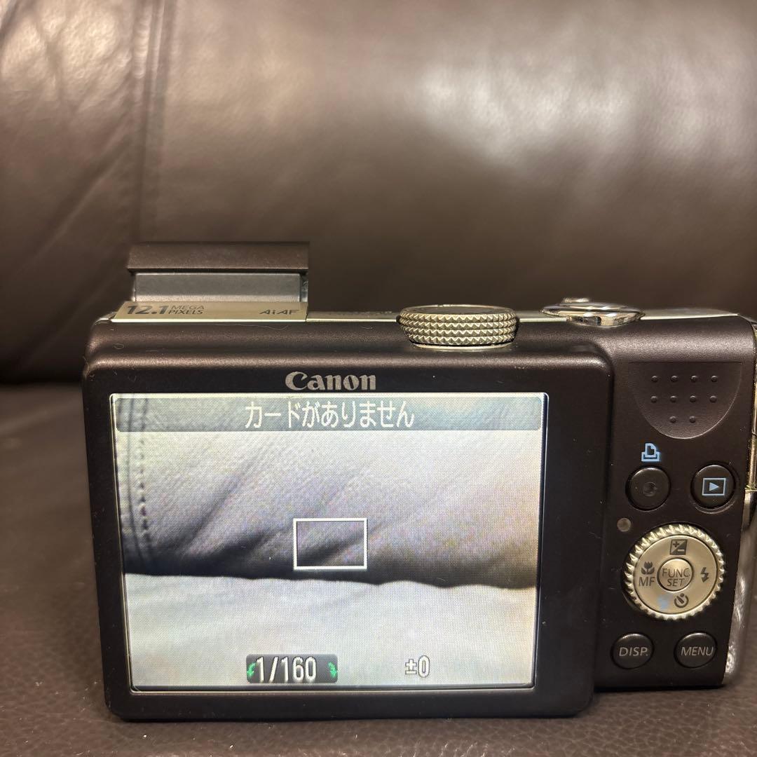 Canon PowerShot SX200 IS 本体と充電器