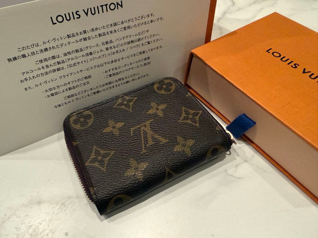 LOUIS VUITTON ジッピー・パース