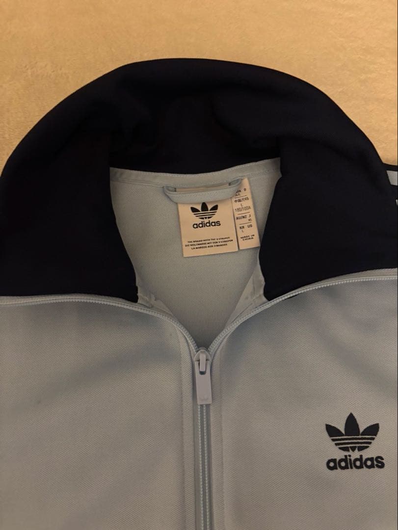 adidas ライトブルー ジップアップジャケット