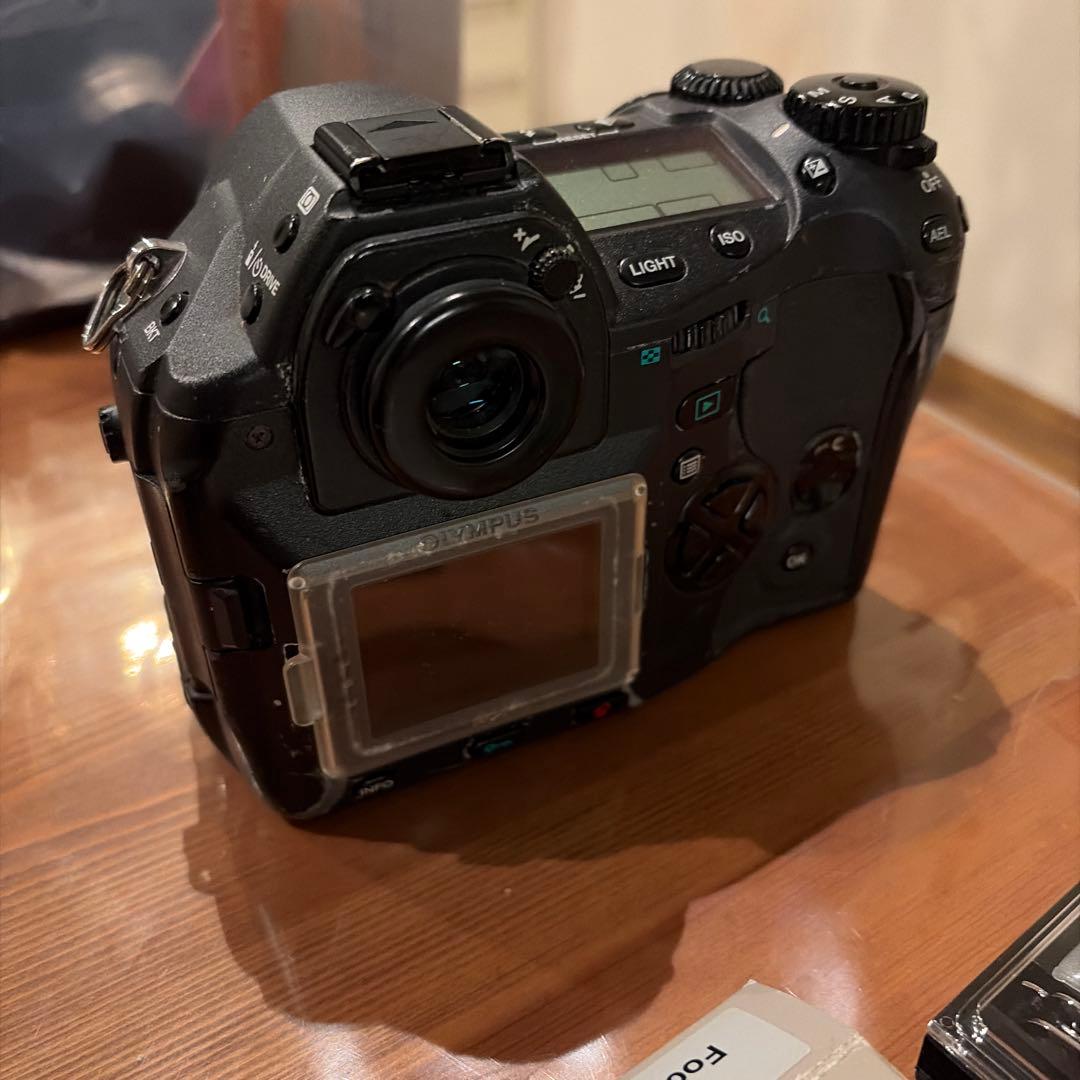 ブ*ン様 OLYMPUS E-1 OMマニュアル標準レンズf1.4とマウントアダ