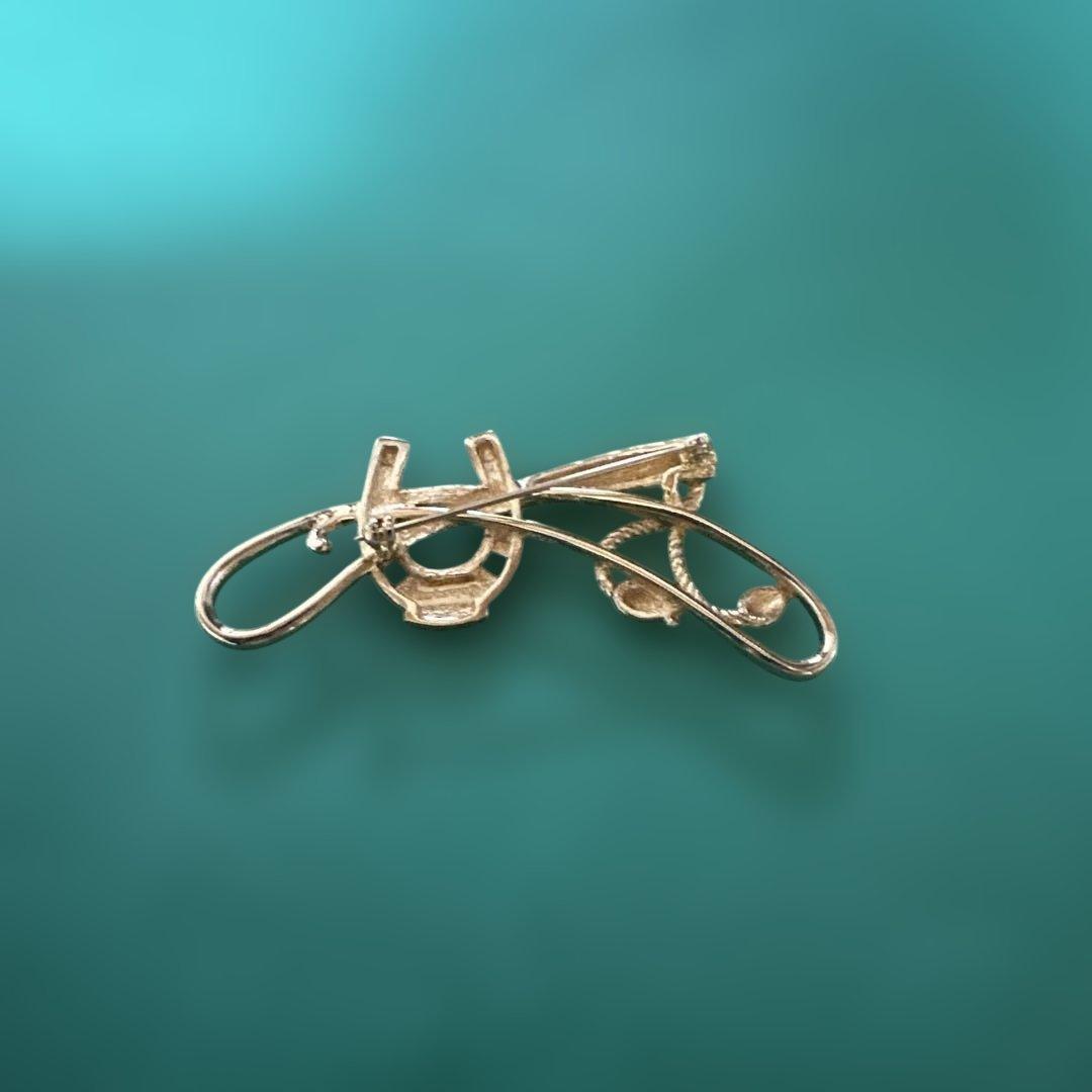 BURBERRY ゴールドブローチ