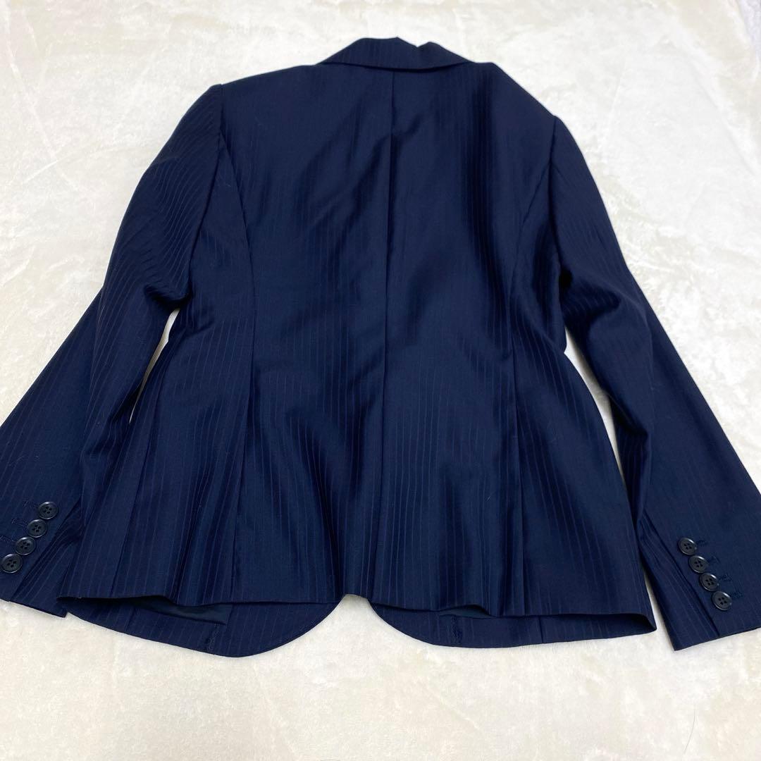 【新品タグ付き】ザスーツカンパニーパンツスーツ　REDA ストレッチ Lサイズ