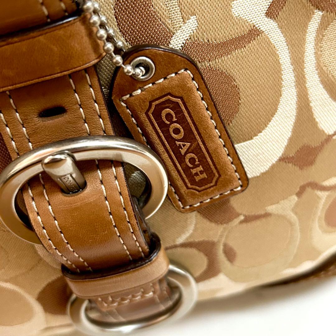 美品 コーチ ハンドバッグ シグネチャー チャーム付 レザー本革 ターンロック