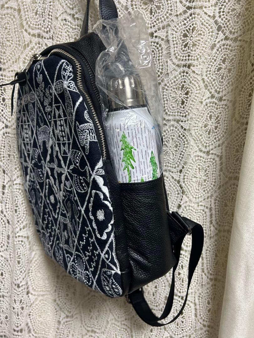 51005A ミナペルホネンハーフハンドメイド本革リュック　シンフォニー