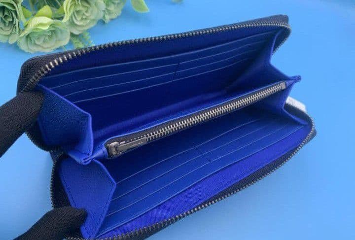 新品未使用コーチ長財布シグネチャーロングジップブルーメンズ送料無料即日発送