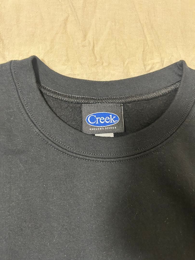 し*ん様 Creek ロゴ BLACK CREW NECK クルーネック トレー