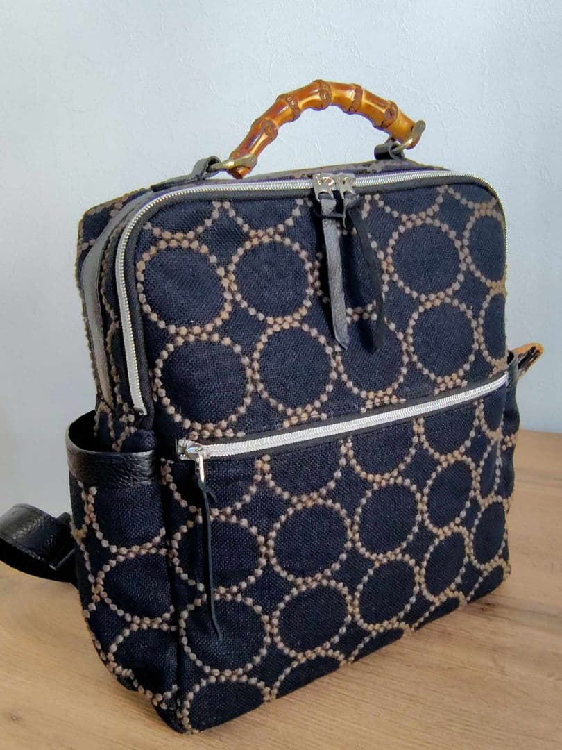 ミナペルホネン/タンバリンBK×カーキ/A4バンブーリュック本革黒