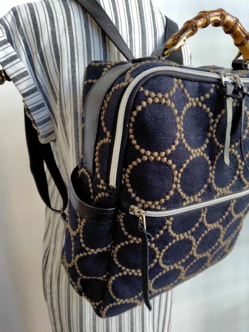 ミナペルホネン/タンバリンBK×カーキ/A4バンブーリュック本革黒