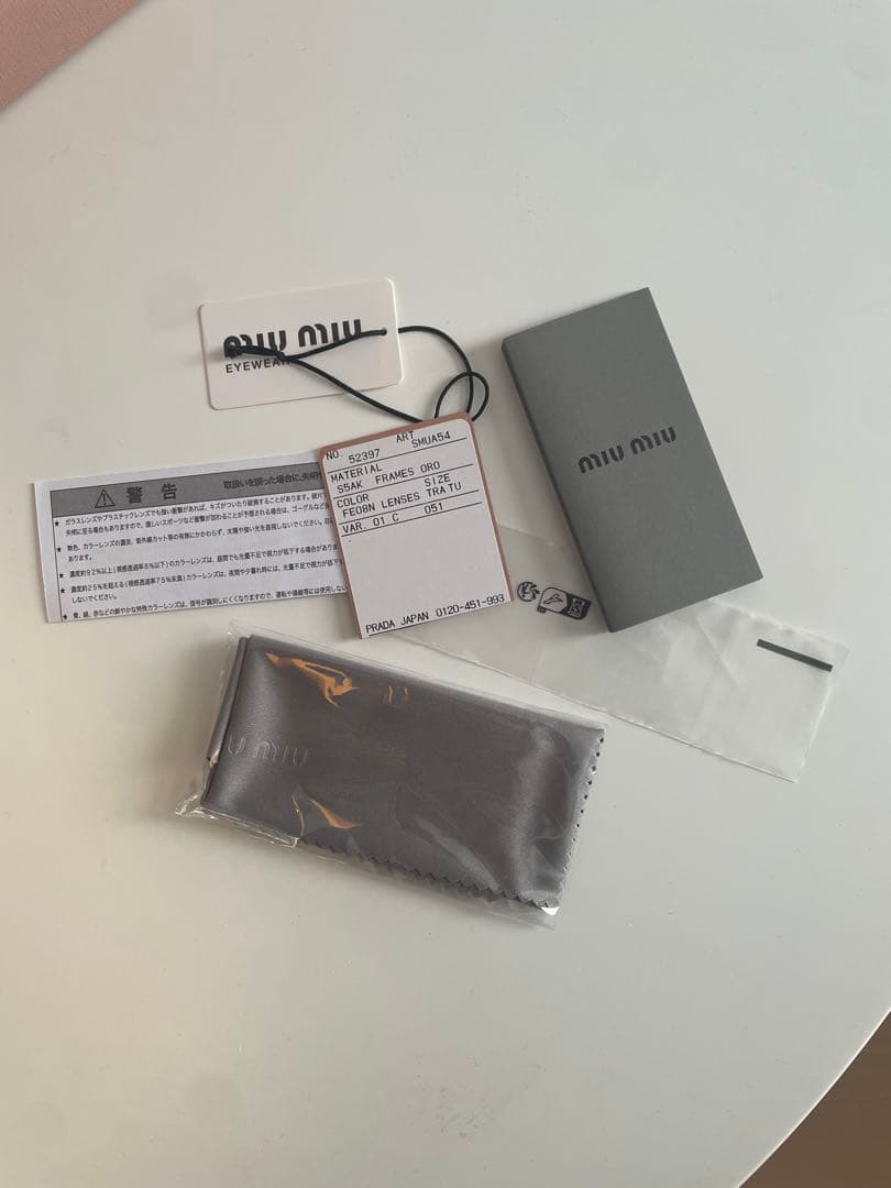 miumiu リムレスメガネ