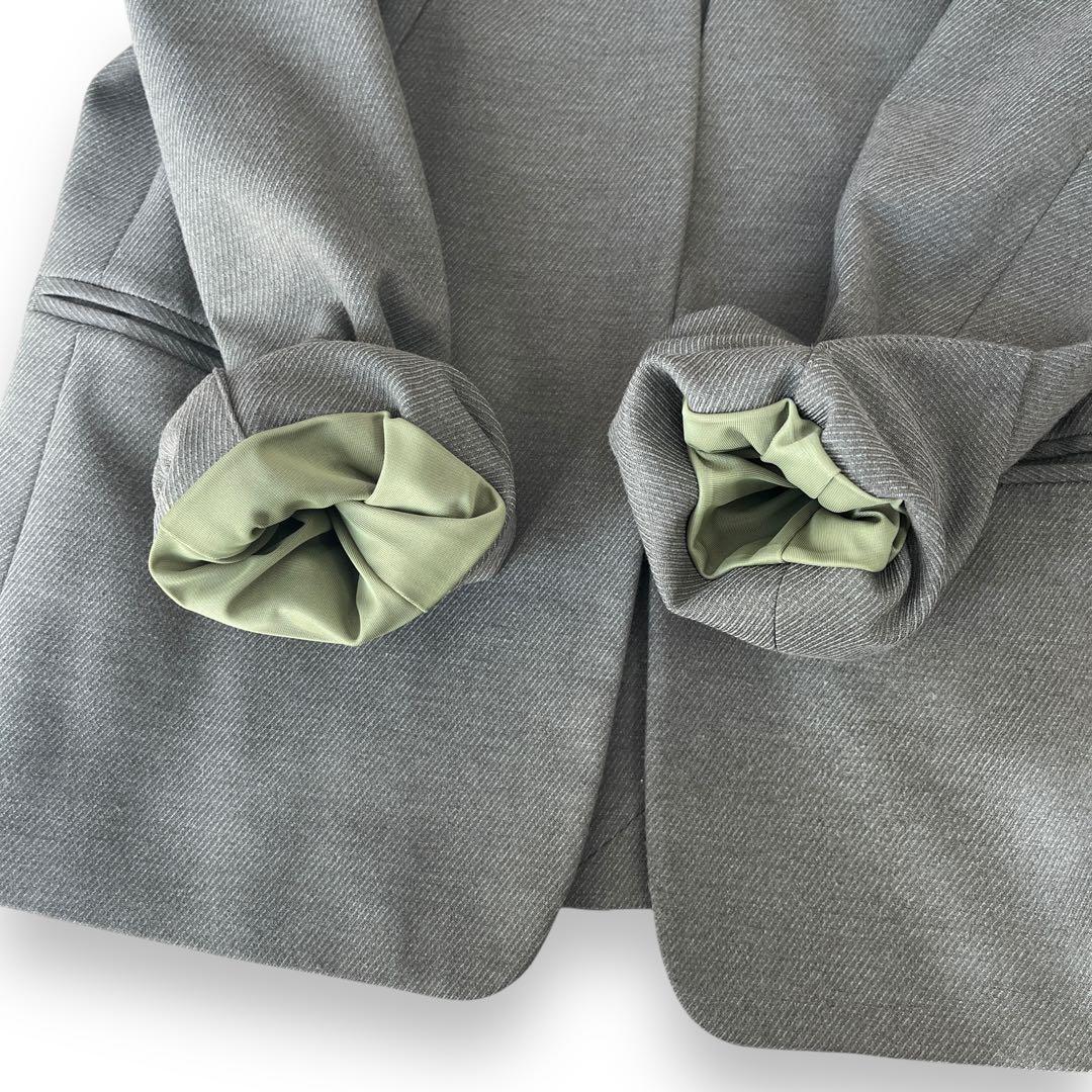 グリーンレーベルリラクシング　ノーカラー　パンツ　セットアップスーツ　グレー