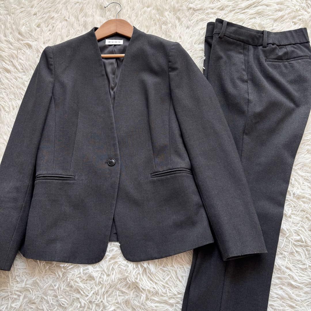 プラステ ウォームリザーブ カラーレス パンツスーツ セットアップM チャコール