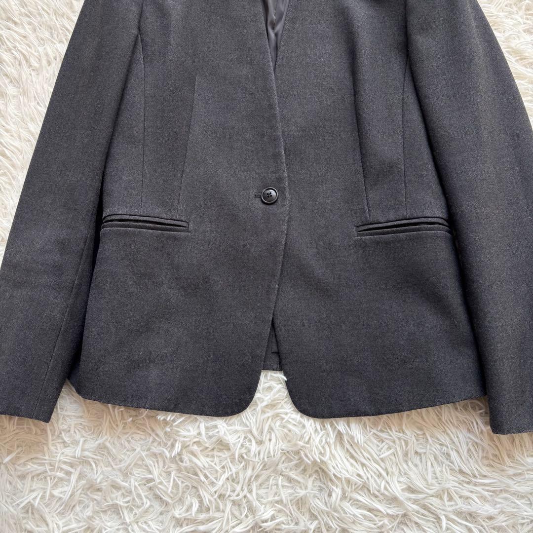 プラステ ウォームリザーブ カラーレス パンツスーツ セットアップM チャコール