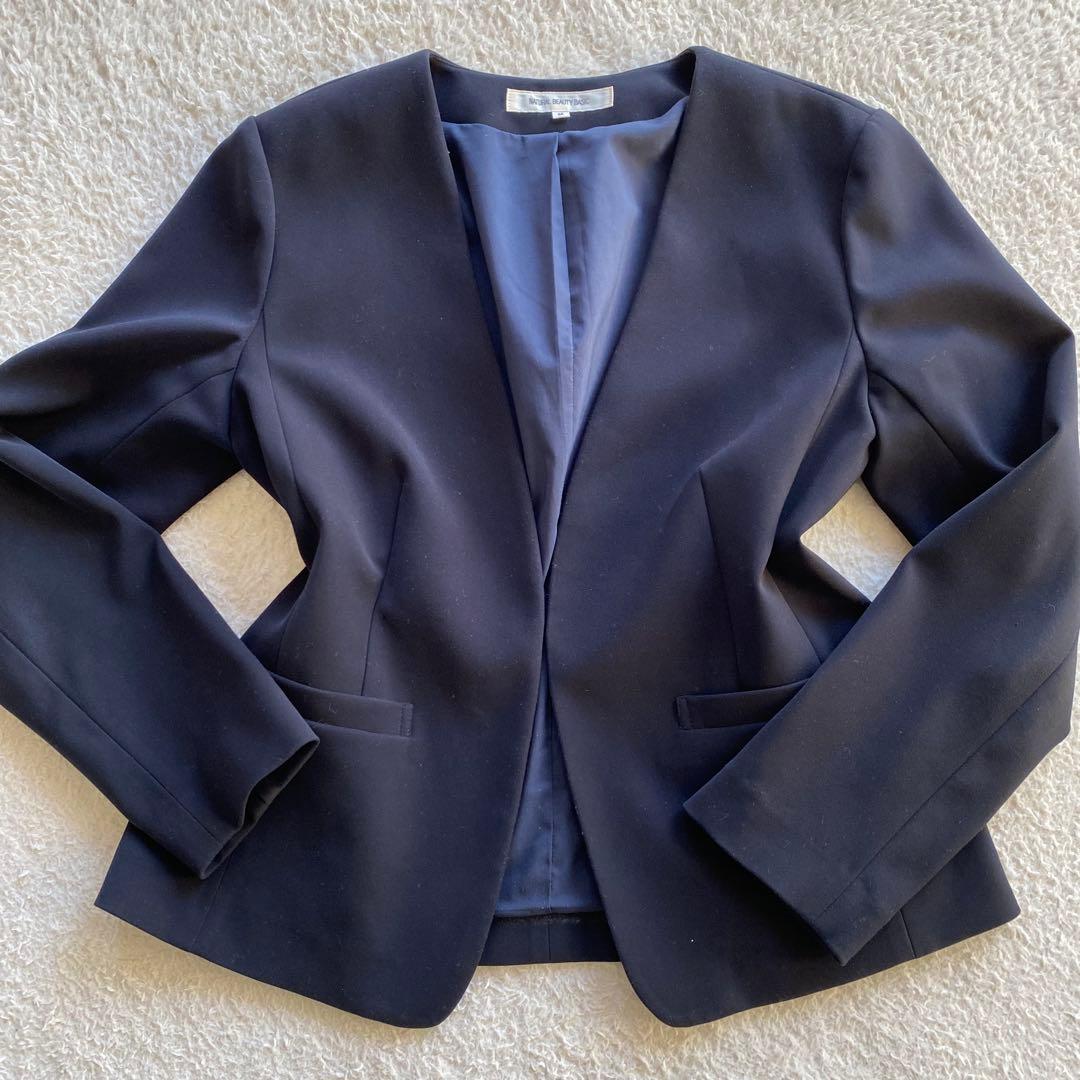 【美品】ナチュラルビューティベーシック パンツスーツ ノーカラー ネイビー Ｍ