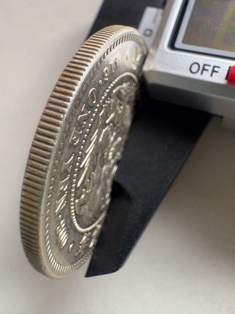 【本物保証】　一圓銀貨　丸銀左打　明治29年銘