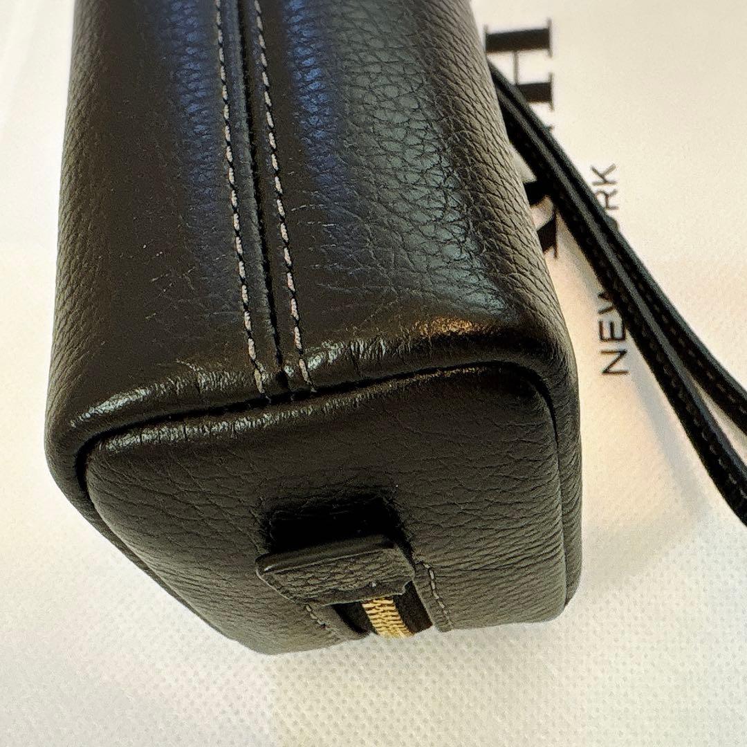 ［限定］coach コーチ コスメティックポーチ 恐竜 レキシー