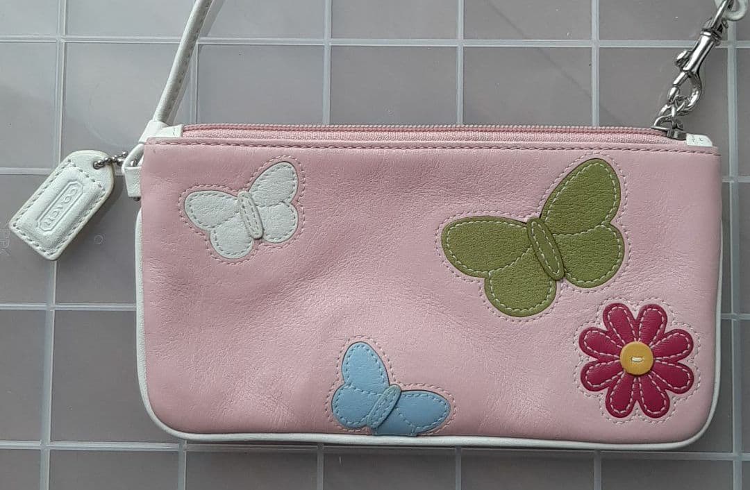 COACH　限定品　本革ポーチ 　蝶とお花