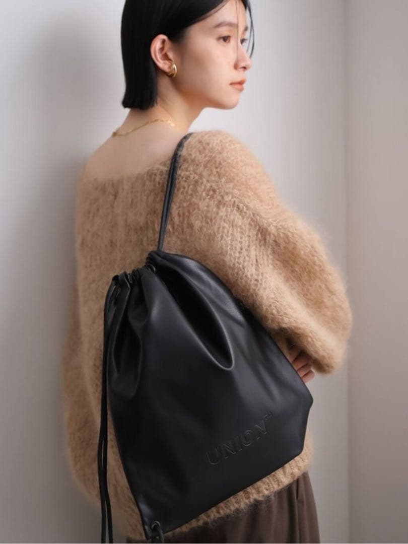 バッグ Union Magazine backpack M's Black Swan
