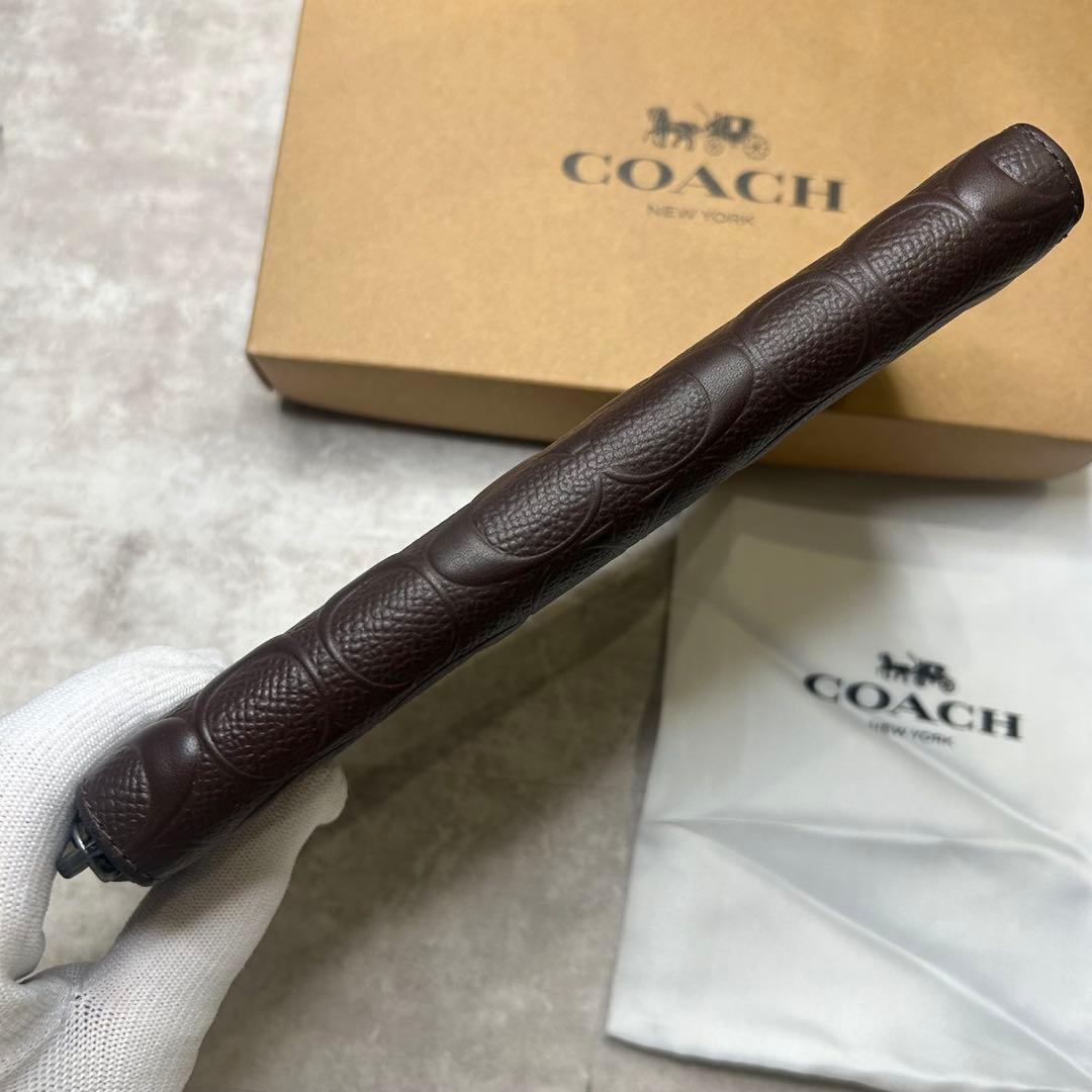 新品未使用 コーチ シグネチャー型押しエンボス レザー ブラウン 長財布