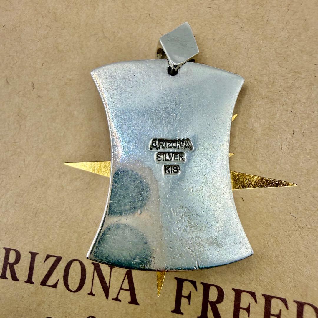 美品　アリゾナフリーダム　k18太陽神付チャーム銀縄ガーネット
