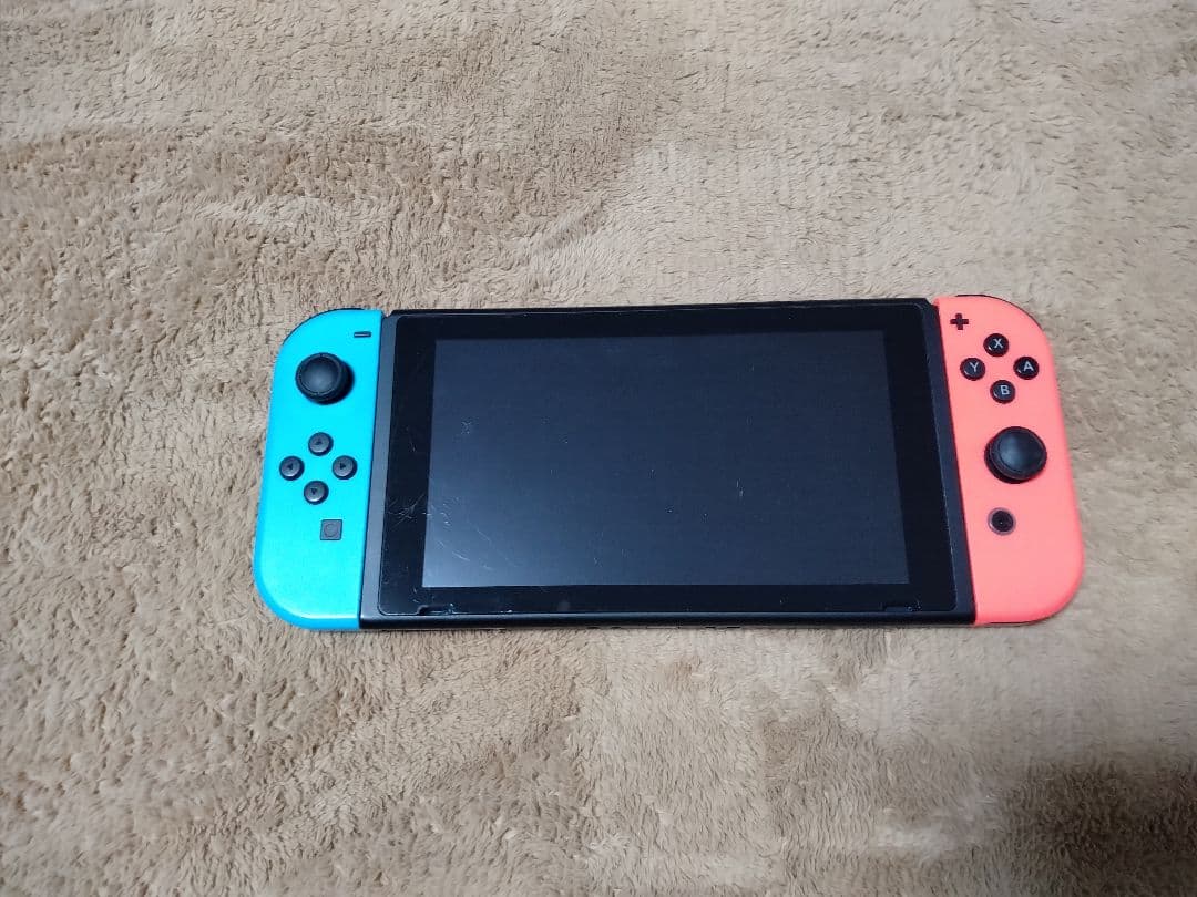 Nintendo Switch 本体、レッグバンド付き