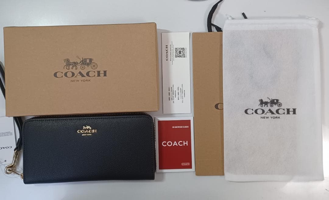 新品 未使用 COACH コーチ ラウンドジップ長財布 あんしん鑑定利用可能