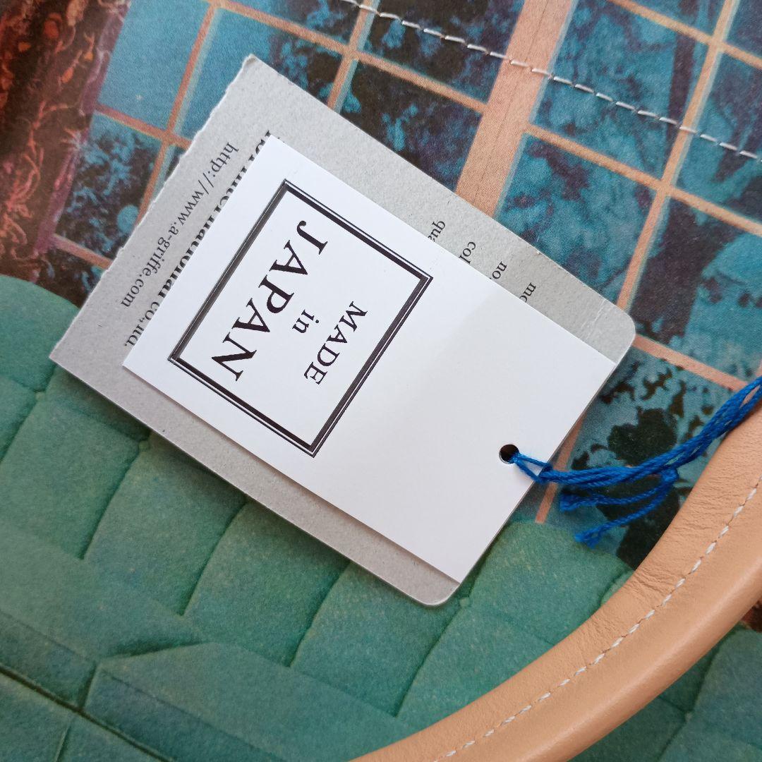 新品　A-griffe バッグ　アグリ東京　世界にひとつ　英字新聞