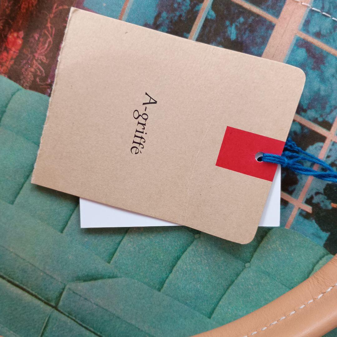 新品　A-griffe バッグ　アグリ東京　世界にひとつ　英字新聞